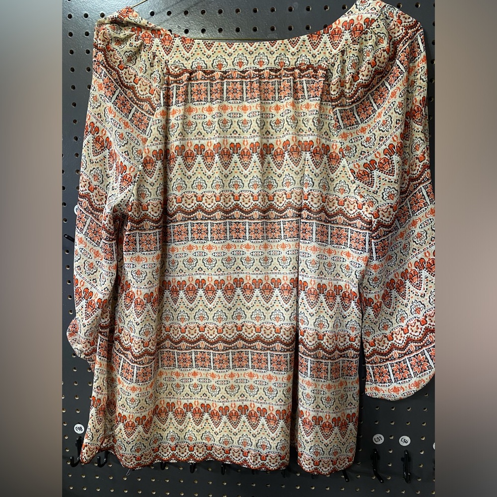 Rebecca Malone used women’s top XL